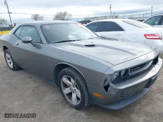 2011 Dodge Challenger with VIN 2B3CJ4DG0BH524693, listed as a IAAI auction lot 41956281 with 153,259 mi miles. Bid and sale history available at carsss.com. Image 1.