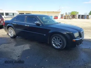 2005 Chrysler 300 with VIN 2C3AA63H65H145122, listed as a IAAI auction lot 41847043 with 237,757 mi miles. Bid and sale history available at carsss.com. Image 1.