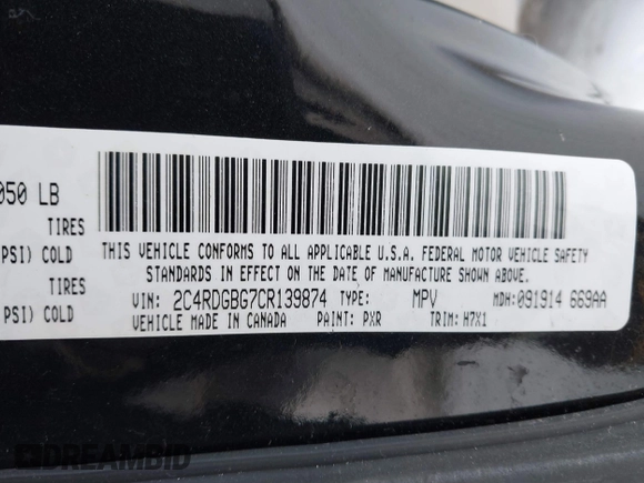 2012 Dodge Grand Caravan SE with VIN 2C4RDGBG7CR139874, listed as a IAAI auction lot 41377432 with 136,870 mi miles and . Bid and sale history available at DreamBid. Image 9.