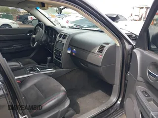 2009 Dodge Charger SRT-8 with VIN 2B3KA73W89H587394, listed as a IAAI auction lot 41795511 with 85,398 mi miles and . Bid and sale history available at carsss.com. Image 5.