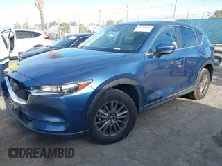2021 Mazda CX-5 Touring with VIN JM3KFACM5M0332718, listed as a IAAI auction lot 41905933 with 30,930 mi miles. Bid and sale history available at carsss.com. Image 18.