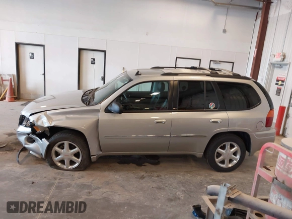 2007 GMC Envoy SLE z VIN 1GKDT13S572152757, wystawiony jako IAAI lot #42095239 z przebiegiem 50 510 mil mil oraz . Historia ofert i sprzedaży dostępna na DreamBid. Obrazek 14.