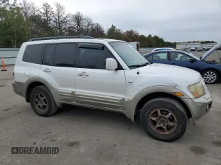 2002 Mitsubishi Montero Limited z VIN JA4MW51R52J027289, wystawiony jako Copart lot #71921024 z przebiegiem 199 334 mil mil oraz Tytuł czysty. Historia ofert i sprzedaży dostępna na DreamBid. Obrazek 4.
