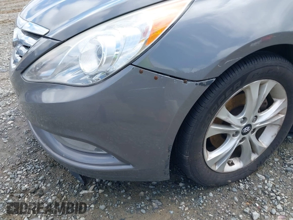 2012 Hyundai Sonata SE z VIN 5NPEC4AC9CH382890, wystawiony jako IAAI lot #42263586 z przebiegiem 159 138 mil mil oraz . Historia ofert i sprzedaży dostępna na DreamBid. Obrazek 6.