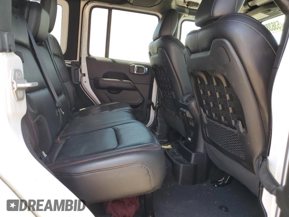 2018 Jeep Wrangler Unlimited Rubicon with VIN 1C4HJXFG9JW308991, listed as a Copart auction lot 53638955 with 95,508 mi miles and Salvage title. Bid and sale history available at DreamBid. Image 10.