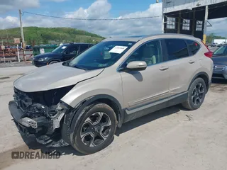 2017 Honda CR-V Touring with VIN 5J6RW2H91HL013526, listed as a IAAI auction lot 42181848 with 108,126 mi miles and . Bid and sale history available at carsss.com. Image 18.