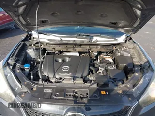 2015 Mazda CX-5 Sport with VIN JM3KE4BY1F0543507, listed as a IAAI auction lot 41530491 with 127,995 mi miles. Bid and sale history available at carsss.com. Image 10.