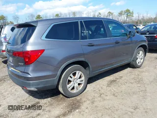 2016 Honda Pilot LX with VIN 5FNYF6H14GB082537, listed as a IAAI auction lot 41864525 with 137,097 mi miles. Bid and sale history available at carsss.com. Image 4.
