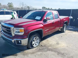 2014 GMC Sierra 1500 SLE with VIN 1GTV2UEH3EZ295586, listed as a IAAI auction lot 41399287 with 124,973 mi miles. Bid and sale history available at carsss.com. Image 2.