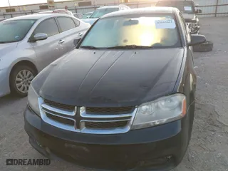 2014 Dodge Avenger SE with VIN 1C3CDZAB3EN148292, listed as a IAAI auction lot 42043642 with 134,676 mi miles. Bid and sale history available at carsss.com. Image 6.