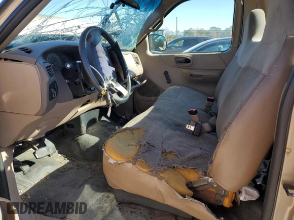 2002 Ford F-150 XL with VIN 1FTRX17L82NB58651, listed as a Copart auction lot 83628134 with Not provided miles and Salvage title. Bid and sale history available at DreamBid. Image 7.