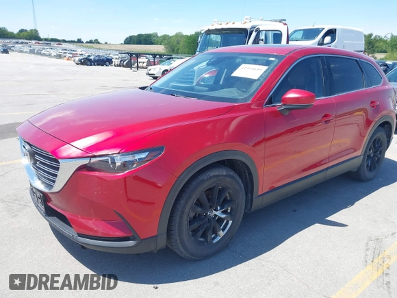 2016 Mazda CX-9 Touring with VIN JM3TCBCY5G0104504, listed as a IAAI auction lot 42314649 with 116,536 mi miles and . Bid and sale history available at DreamBid. Image 17.