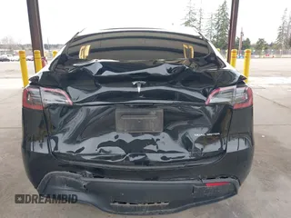 2023 Tesla Model Y Long Range with VIN 7SAYGDEE4PF789102, listed as a IAAI auction lot 41788860 with 88,457 mi miles and . Bid and sale history available at DreamBid. Image 16.