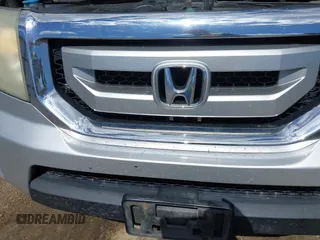 2009 Honda Pilot Touring with VIN 5FNYF48969B018075, listed as a IAAI auction lot 42052333 with 206,700 mi miles and . Bid and sale history available at carsss.com. Image 6.