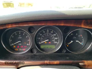2004 Jaguar XJ with VIN SAJWA71CX4SG32785, listed as a Copart auction lot 69792134 with 183,705 mi miles and Non Repairable. Bid and sale history available at carsss.com. Image 9.