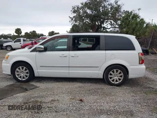 2014 Chrysler Town & Country Touring-L with VIN 2C4RC1CG7ER460427, listed as a IAAI auction lot 40876176 with 177,707 mi miles. Bid and sale history available at carsss.com. Image 14.