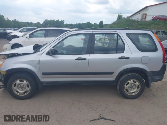 2002 Honda CR-V LX z VIN JHLRD78562C081322, wystawiony jako IAAI lot #42452985 z przebiegiem 193 011 mil mil oraz . Historia ofert i sprzedaży dostępna na DreamBid. Obrazek 15.