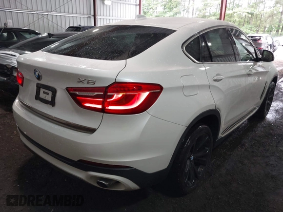 2015 BMW X6 sDrive35i z VIN 5UXKU0C54F0F91660, wystawiony jako IAAI lot #42375390 z przebiegiem 150 209 mil mil oraz . Historia ofert i sprzedaży dostępna na DreamBid. Obrazek 4.