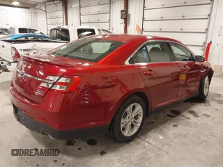 2014 Ford Taurus SEL z VIN 1FAHP2E83EG137639, wystawiony jako IAAI lot #41535259 z przebiegiem 62 978 mil mil oraz . Historia ofert i sprzedaży dostępna na DreamBid. Obrazek 4.