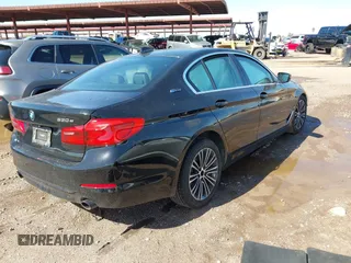 2019 BMW 5 Series 530e iPerformance with VIN WBAJA9C55KB392765, listed as a IAAI auction lot 41748610 with 60,834 mi miles. Bid and sale history available at carsss.com. Image 4.