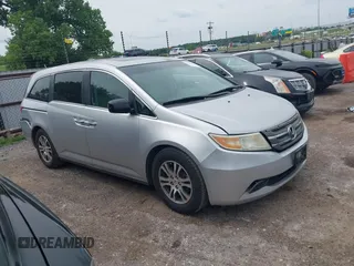 2012 Honda Odyssey EX-L with VIN 5FNRL5H66CB081323, listed as a IAAI auction lot 42465110 with 266,934 mi miles and . Bid and sale history available at DreamBid. Image 13.
