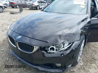 2014 BMW 4 Series 435i with VIN WBA3T3C50EJ876997, listed as a IAAI auction lot 42406299 with 115,048 mi miles and . Bid and sale history available at DreamBid. Image 6.