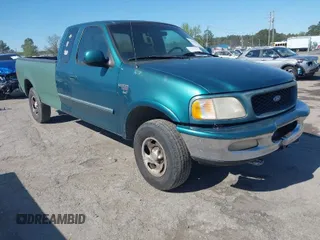 1997 Ford F-150 XL with VIN 1FTDX1861VNA45664, listed as a IAAI auction lot 42005279 with 209,847 mi miles. Bid and sale history available at carsss.com. Image 1.