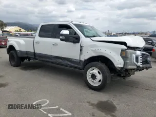 2021 Ford F-450 XL with VIN 1FT8W4DTXMED30296, listed as a Copart auction lot 53511365 with 25,593 mi miles and Salvage Title. Bid and sale history available at carsss.com. Image 4.