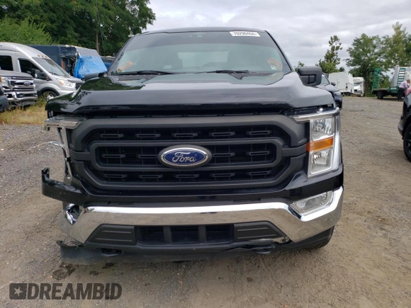 2021 Ford F-150 XL with VIN 1FTFW1ED0MFB39526, listed as a Copart auction lot 83764754 with 65,581 mi miles and Salvage Title. Bid and sale history available at carsss.com. Image 5.