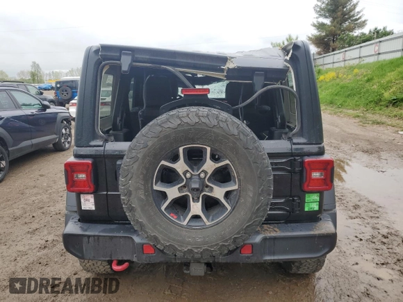 2021 Jeep Wrangler Unlimited Rubicon with VIN 1C4HJXFNXMW612186, listed as a Copart auction lot 56786665 with 52,379 mi miles and Salvage title. Bid and sale history available at DreamBid. Image 6.
