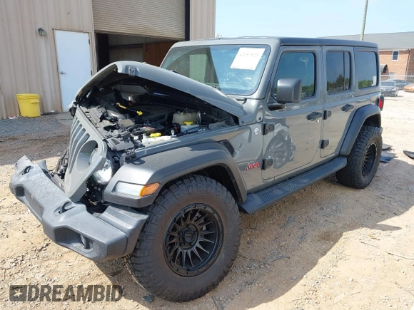 2019 Jeep Wrangler Unlimited Sport S with VIN 1C4HJXDG3KW662946, listed as a IAAI auction lot 42157025 with 26,096 mi miles and . Bid and sale history available at DreamBid. Image 2.