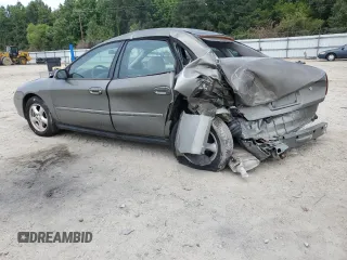 2002 Ford Taurus SES Standard with VIN 1FAFP55U42A184084, listed as a Copart auction lot 59822495 with 124,835 mi miles and Salvage title. Bid and sale history available at DreamBid. Image 2.