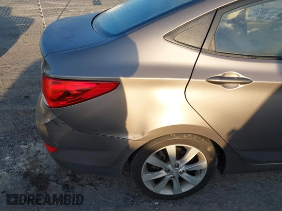 2012 Hyundai Accent GLS with VIN KMHCU4AE4CU097425, listed as a IAAI auction lot 42052740 with 244,705 mi miles. Bid and sale history available at carsss.com. Image 13.