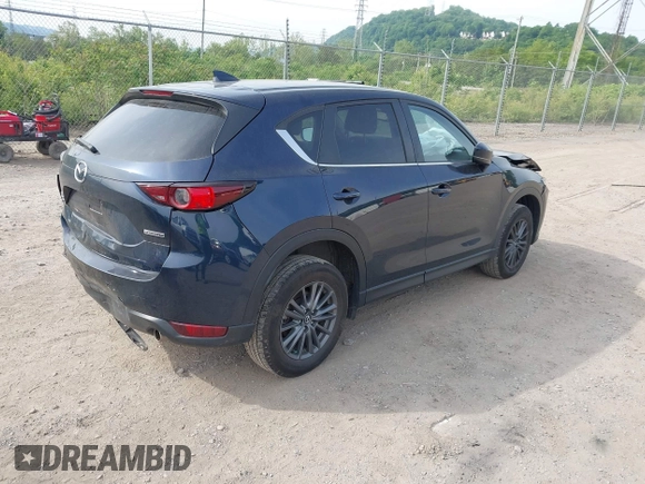 2021 Mazda CX-5 Touring z VIN JM3KFBCMXM0389857, wystawiony jako IAAI lot #42309650 z przebiegiem 49 938 mil mil oraz . Historia ofert i sprzedaży dostępna na DreamBid. Obrazek 4.