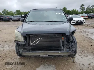 2006 Honda Pilot EX-L with VIN 5FNYF28516B003593, listed as a Copart auction lot 53879665 with 153,264 mi miles and Salvage Title. Bid and sale history available at DreamBid. Image 5.