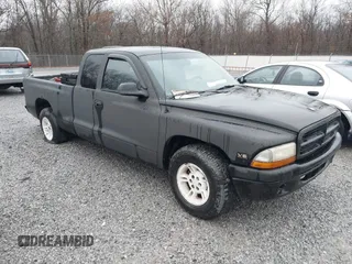 1999 Dodge Dakota SLT z VIN 1B7GL22X3XS181329, wystawiony jako IAAI lot #41480264 z przebiegiem 227 616 mil mil oraz . Historia ofert i sprzedaży dostępna na DreamBid. Obrazek 1.
