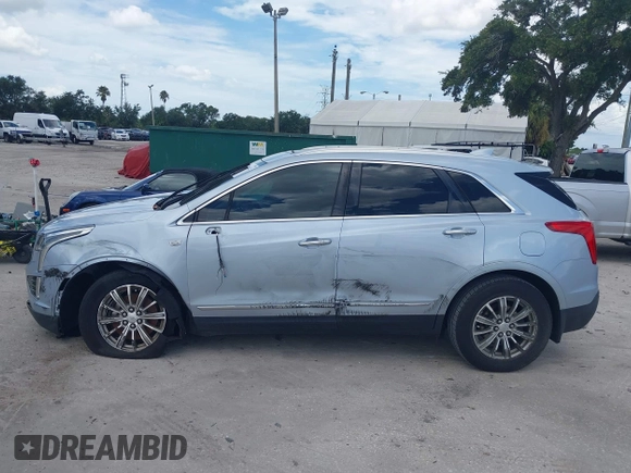 2017 Cadillac XT5 Luxury FWD z VIN 1GYKNBRSXHZ325914, wystawiony jako IAAI lot #42776412 z przebiegiem 85 014 mil mil oraz . Historia ofert i sprzedaży dostępna na DreamBid. Obrazek 14.
