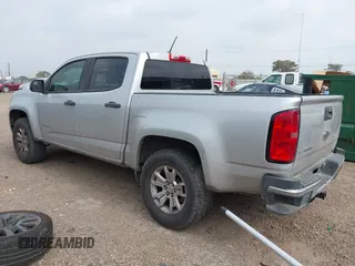 2018 Chevrolet Colorado 2WD Work Truck with VIN 1GCGSBEA9J1129890, listed as a IAAI auction lot 42054763 with 118,962 mi miles and . Bid and sale history available at DreamBid. Image 3.