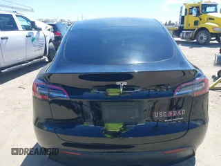 2020 Tesla Model Y Long Range with VIN 5YJYGDEE2LF059177, listed as a IAAI auction lot 41916260 with 66,190 mi miles and . Bid and sale history available at DreamBid. Image 16.