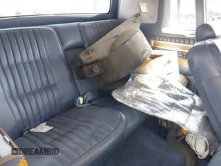 1984 Cadillac DeVille z VIN 1G6AM4784E9070781, wystawiony jako IAAI lot #42322274 z przebiegiem 126 933 mil mil oraz . Historia ofert i sprzedaży dostępna na DreamBid. Obrazek 8.