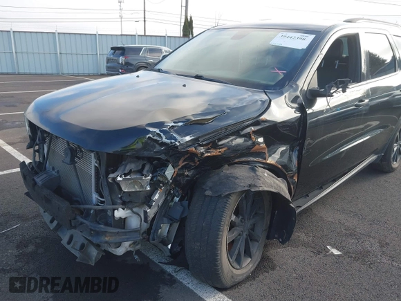 2014 Dodge Durango Limited with VIN 1C4SDHDT2EC405671, listed as a IAAI auction lot 39442398 with 154,469 mi miles and . Bid and sale history available at DreamBid. Image 6.