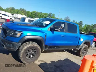 2021 Ram 1500 TRX z VIN 1C6SRFU91MN900450, wystawiony jako IAAI lot #42102724 z przebiegiem 80 071 mil mil oraz . Historia ofert i sprzedaży dostępna na DreamBid. Obrazek 13.