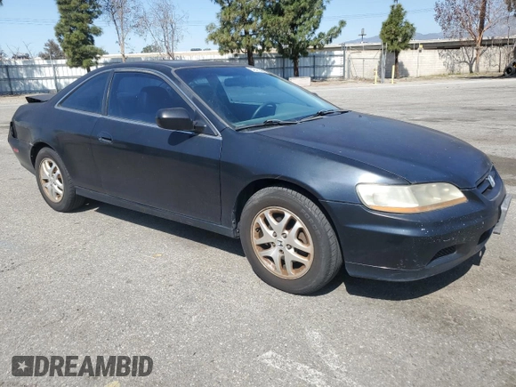 2001 Honda Accord EX с VIN 1HGCG22551A022831, выставлен на аукционе Copart как лот 52011585 с пробегом 248 025 миль миль и Списание • Salvage title. История ставок и продаж доступна на DreamBid. Изображение 4.