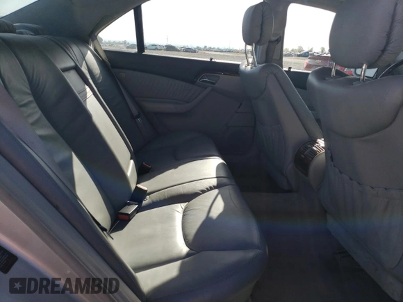 2002 Mercedes-Benz S-Class 5.0L with VIN WDBNG75JX2A306811, listed as a Copart auction lot 52042105 with 206,531 mi miles and Salvage Title. Bid and sale history available at carsss.com. Image 10.