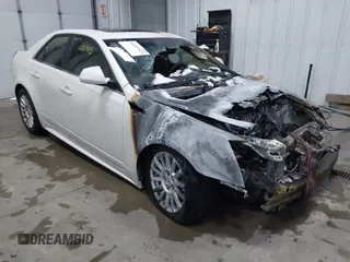2013 Cadillac CTS Luxury z VIN 1G6DG5E56D0113054, wystawiony jako IAAI lot #41297913 z przebiegiem 171 100 mil mil oraz . Historia ofert i sprzedaży dostępna na DreamBid. Obrazek 1.