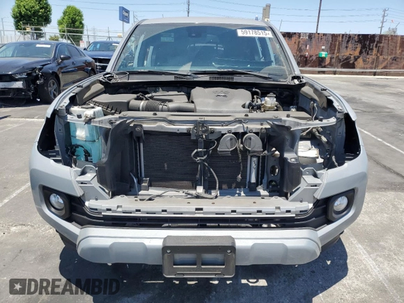 2021 Toyota Tacoma SR5 with VIN 3TMBZ5DNXMM031339, listed as a Copart auction lot 59178515 with 27,885 mi miles and Salvage title. Bid and sale history available at DreamBid. Image 5.