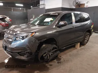 2022 Honda Pilot EX-L with VIN 5FNYF6H59NB000754, listed as a IAAI auction lot 42090576 with 32,813 mi miles and . Bid and sale history available at DreamBid. Image 2.