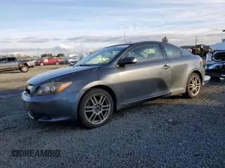2009 Scion tC with VIN JTKDE167590283367, listed as a Copart auction lot 77027814 with 147,984 mi miles and Salvage Title. Bid and sale history available at carsss.com. Image 1.