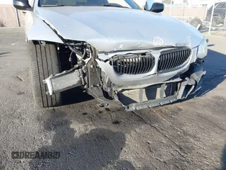 2011 BMW 3 Series 335is with VIN WBAKG1C57BE618727, listed as a IAAI auction lot 41234102 with 154,007 mi miles and . Bid and sale history available at carsss.com. Image 6.