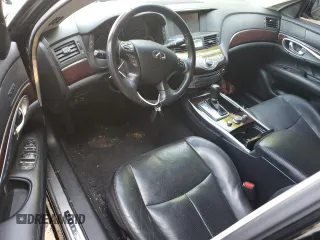 2015 Infiniti Q70 with VIN JN1BY1AP6FM540346, listed as a Copart auction lot 56942445 with 96,962 mi miles and Salvage title. Bid and sale history available at DreamBid. Image 8.
